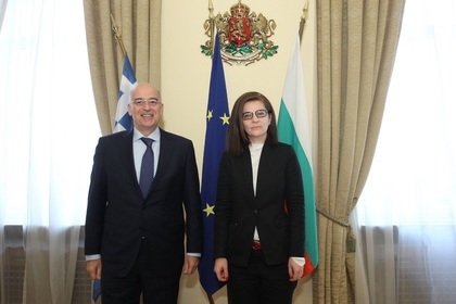Foreign Minister Teodora Gencovska talks with Greek counterpart Nikos Dendias
