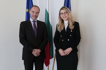 Deputy Minister Velislava Petrova talks with Ambassador Eric Pop, IOF Resident Representative for Central and Eastern Europe